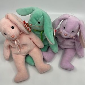 Floppity, hoppity, and Hippity the rabbit beanie babies